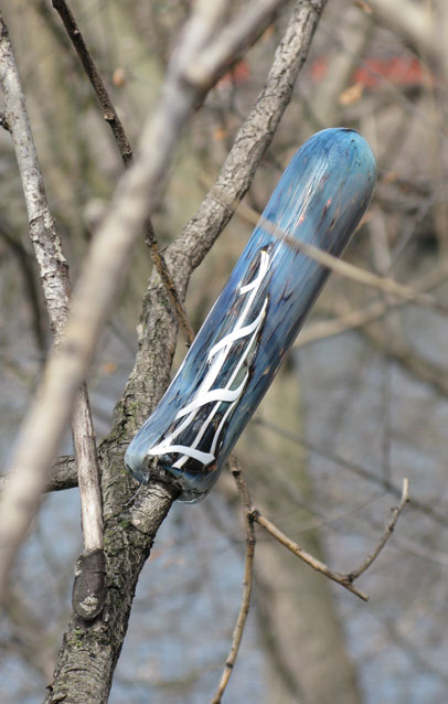 tap handle on tree branch